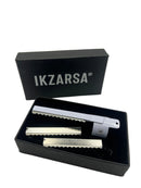 Three metal razors in a black box with 'IKZARSA' branding on a white background