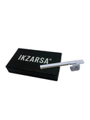 IKZARSA branded black box with a white key-like object on a light gray background