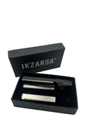 Black box with 'IKZARSA' branding containing metal items on a white background